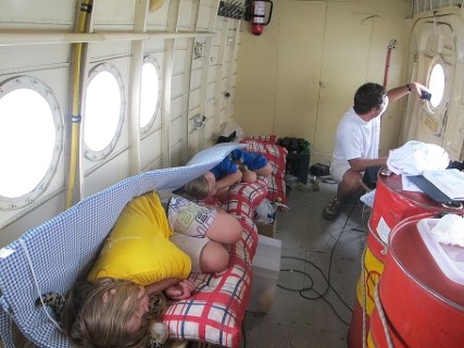 Children_are_sleeping_in_the_AN-2_but_the_radist_ius_still_awake_small_(Mobile).jpg